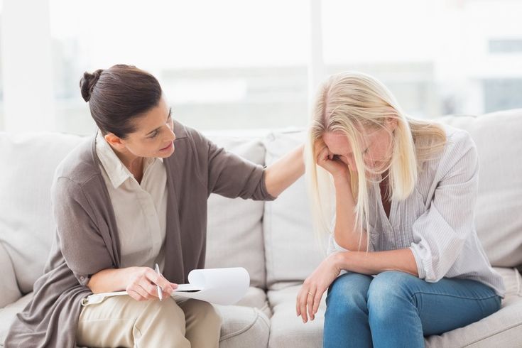 PSYCHIATRIST CONSULTING HER PATIENT FOR INTERPERSONAL TREATMENT